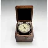 A speed indicator, by Precision Instrument Co Isleworth, No B1136, in wooden case, width 9.5cm.