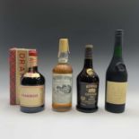 Four bottles of spirits comprising of Drambuie (boxed), VSOP Cognac, Southern Comfort, and Stock