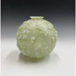 A Lalique opalescent glass vase, 'Druide', moulded with mistletoe with pale green staining,