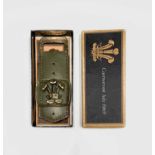 A 1969 Caernarvon Investiture souvenir brass and leather bottle opener, boxed, width 19cm.
