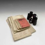 A pair of Carl Zeiss Deltrintem 8X30 binoculars, together with four WWII linen backed maps, ration