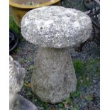 A 19th century granite circular staddle stone. Height 63cm.