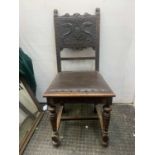 A Victorian oak side chair, with leather embossed back, height 96.5cm, width 44cm.