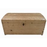 A Victorian pine domed top trunk, height 48cm, width 97.5cm.