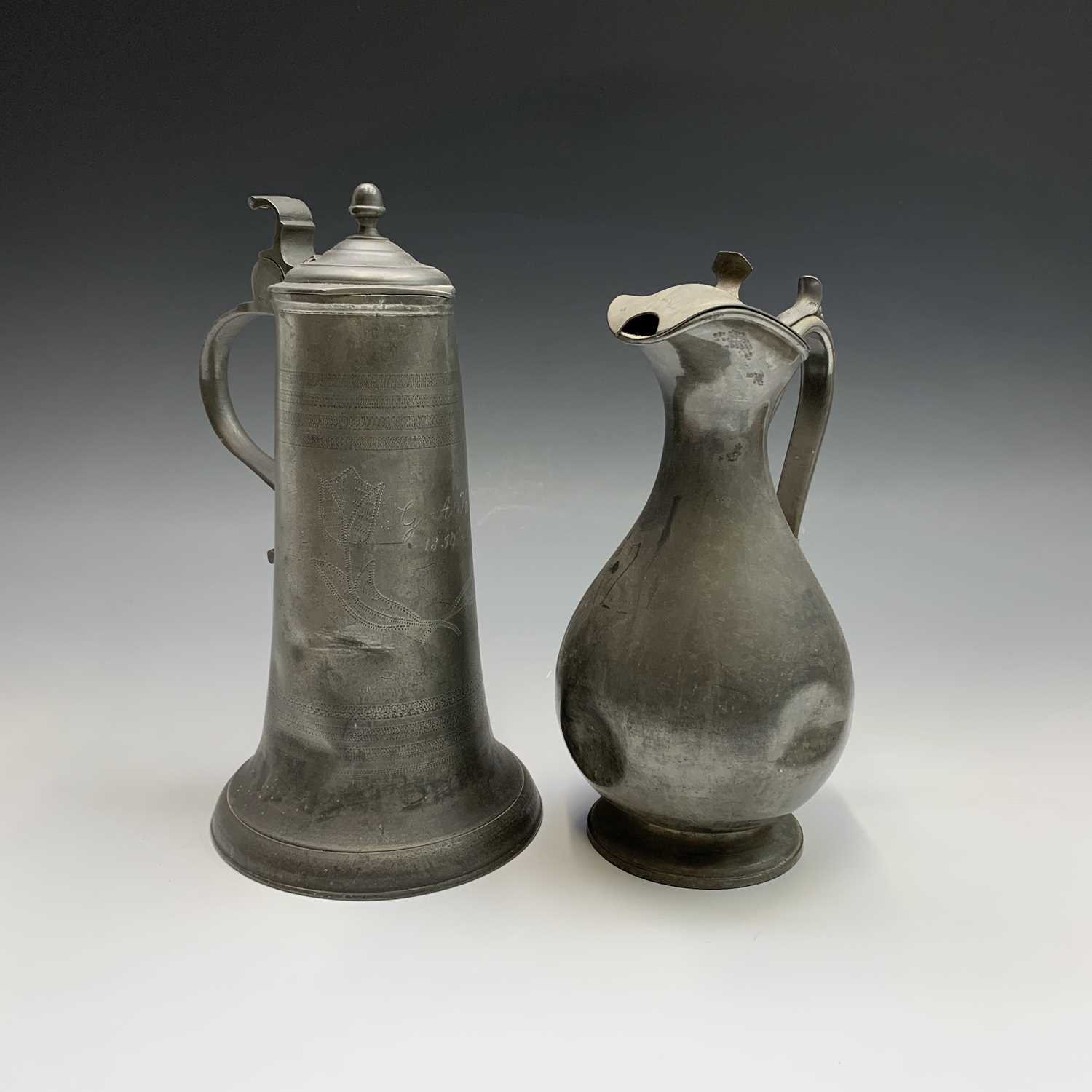 A 19th century pewter flagon with hinged cover, engraved with tulips and initialled G.A.K. and dated - Image 20 of 20