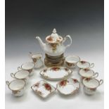 A Royal Albert 'Old Country Roses' tea service comprising tea pot, milk jug, sugar bowl, six