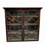 A George III mahogany bookcase top, with a pair of astragal glazed doors enclosing shelves, height