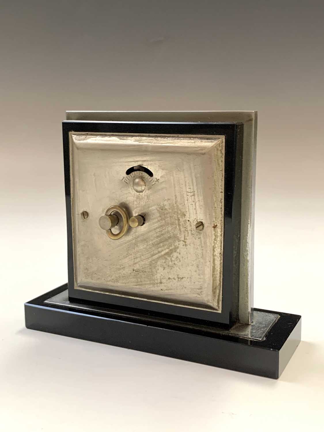 A black glass and nickel plated Art Deco clock. H: 12cm. - Image 3 of 5