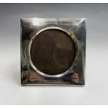 A square photo frame with wide silver border and circular centre, by T F Nicholls & Son Birmingham