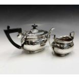 A silver small oval section teapot and similar sugar bowl 14.7oz