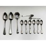 Eleven English silver spoons 11.1oz