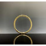 An 18ct gold plain tubular hinged bangle 11.3gm Dia 58mm