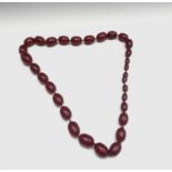 A handsome "Cherry Amber" necklace maximum bead size 35mm 229 grams.