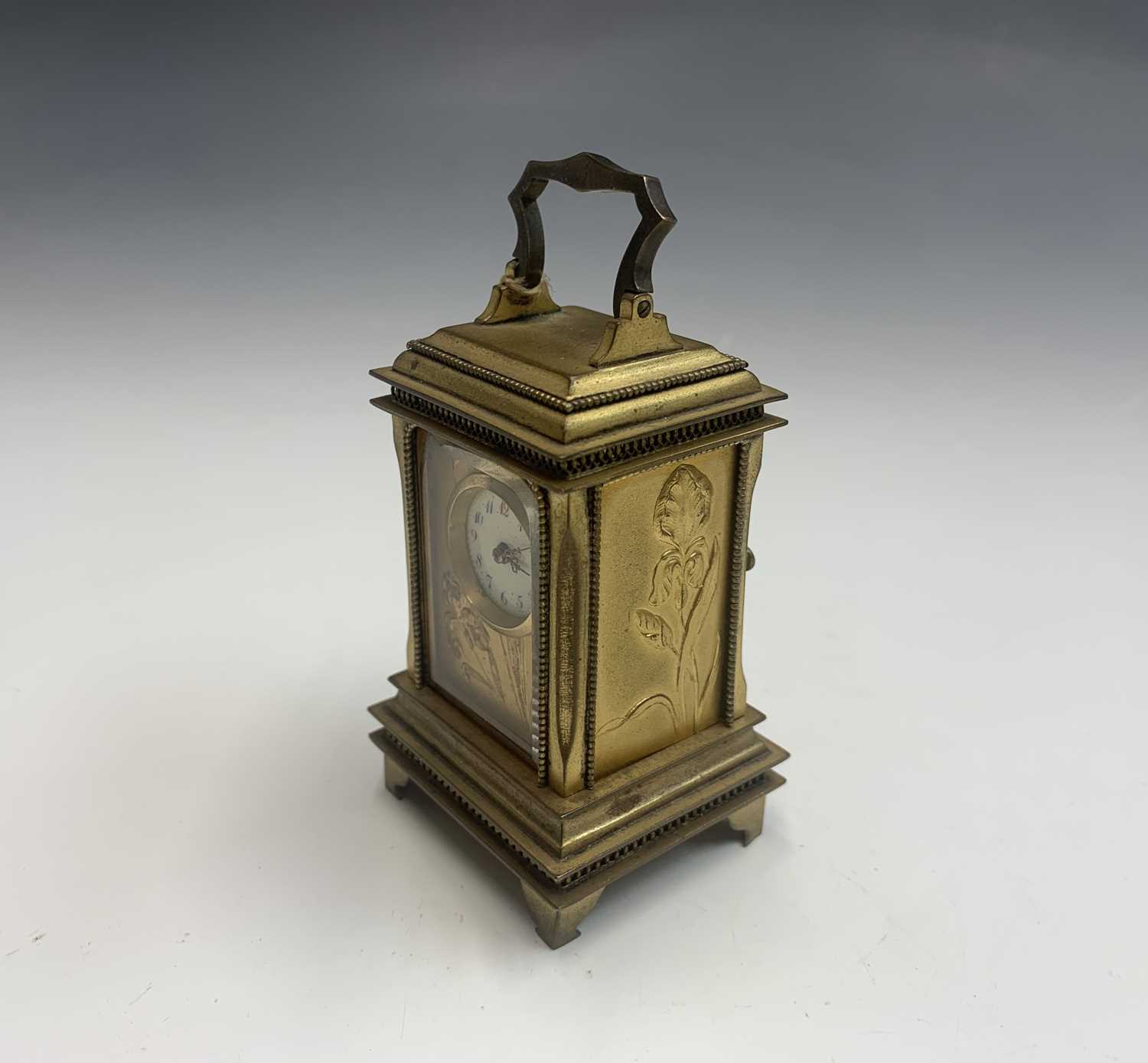A French Art Nouveau gilt bronze miniature alarm carriage clock. - Image 5 of 5