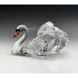A Swarovski Crystal large swan ornament, height 9.5cm, length 18.5cm (boxed).Condition report: No