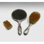 Two silver-mounted brushes and a silver-mounted mirror