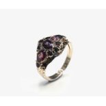 A late Victorian 15ct gold ring set in 18th-century style with amethysts and garnets