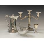 An Art Nouveau EPBM jug a silver egg cup a pair of sauce boats and a candelabrum