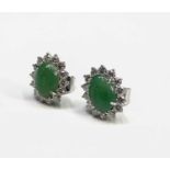 A pair of fine green jade and diamond oval 18ct white gold earrings, 4.2g.