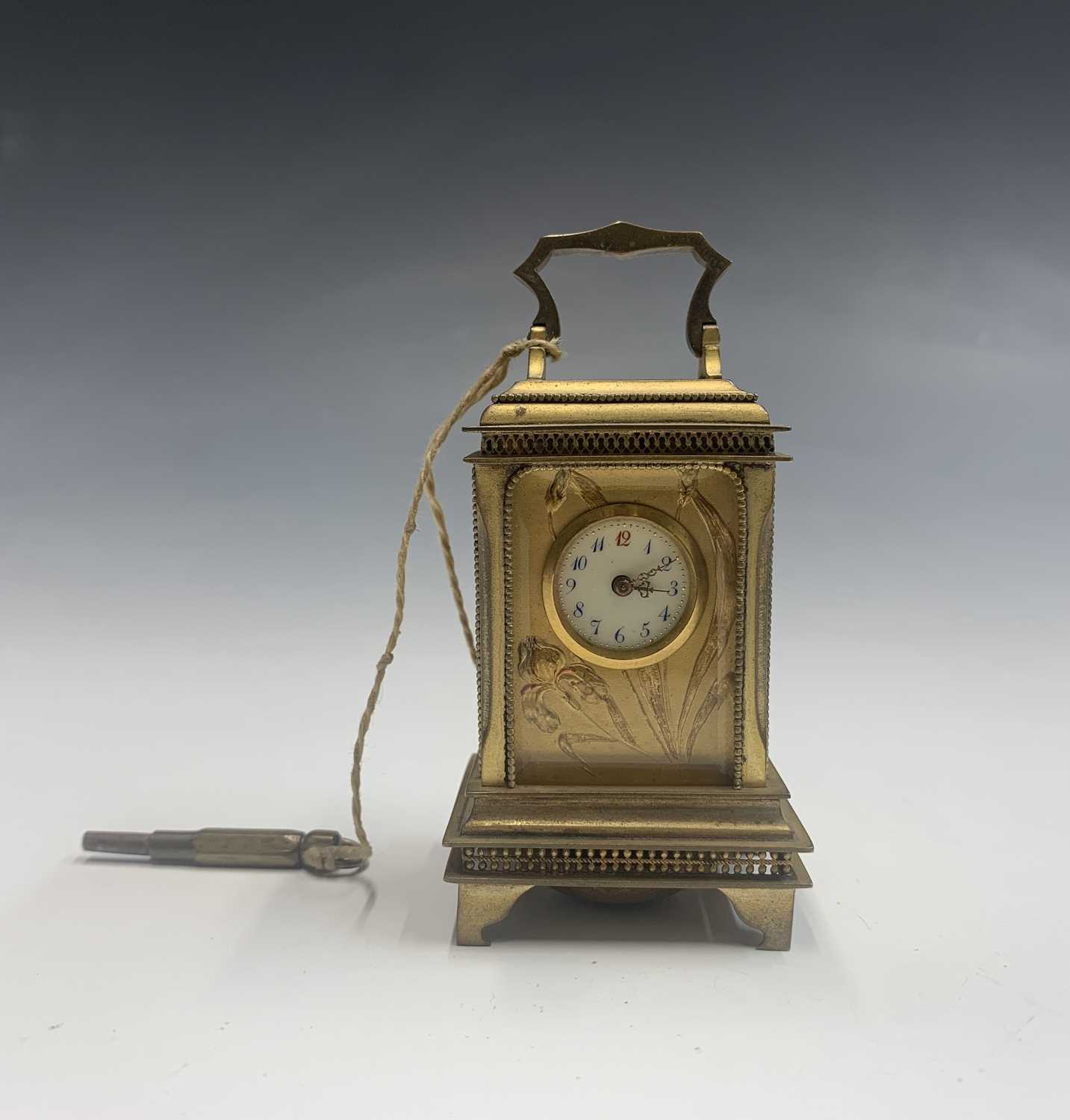 A French Art Nouveau gilt bronze miniature alarm carriage clock. - Image 4 of 5