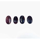 Four carved agate intaglios, approximately 32cts.
