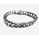 A silver ladder link bracelet 34gm