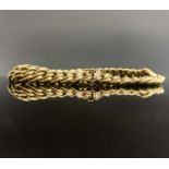 An 18ct gold multilink bracelet 21.1gm