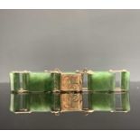 A 9ct gold and jade link bracelet with chased clasp