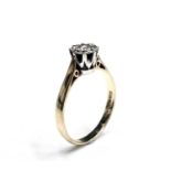 An 18ct gold solitaire diamond ring.L1/2-M leading edgeCondition report: The ring weights 2.7g.