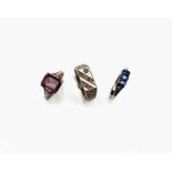 Three 9ct gold stone set rings 6.4gm