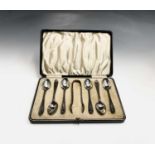 A set of six silver teaspoons and matching tongs Birmingham 1926 4.8oz Cased