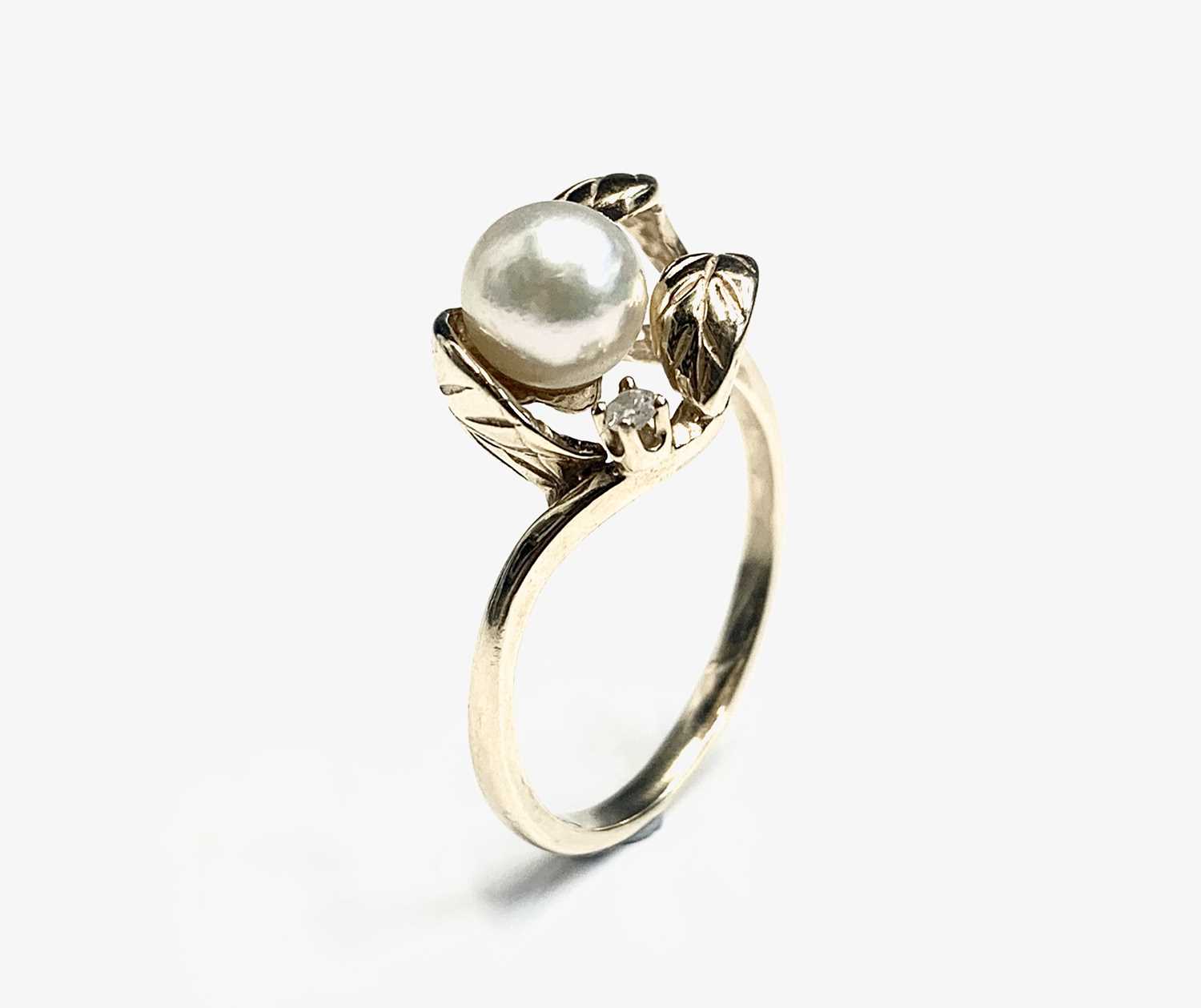 A14ct gold pearl and diamond set ring 3.5gmCondition report: Size N