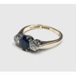 An 18ct gold sapphire and diamond ring.