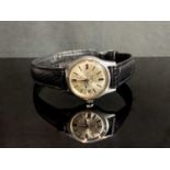 A ladies Omega stainless steel cased automatic wristwatch with calendar apperture, sweep seconds and