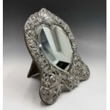 A good Victorian heart-shaped mirror by William Comyns the silver mount pierced and embossed with