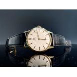 An Omega gentleman's gold plated wristwatch dia 33mm the strap with Omega buckleCondition report: No