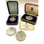 A silver medal for 'The Powell Duffryn Steam Coal Company' 1914, boxed. Together with a sports