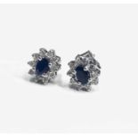 A pair of diamond and sapphire cluster earrings, 2g.