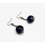 A pair of spherical banded agate drop earrings.