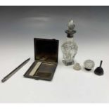 A silver cigarette case 3.70z together with two silver-mounted bottles, an unmarked pencil and an