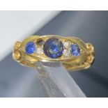 A Victorian 18ct gold ring set three sapphires and three (of four) diamonds.Approx size: M-M1/2