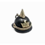 A charm in the form of an Imperial German Pickelhaube