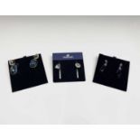 Three pairs of Swarovski Crystal earrings in their original presentation boxes.Condition report: