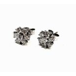 A pair of 18ct white gold diamond cluster earrings, 2.3g.