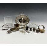 A bonbon basket, four silver thimbles, three silver napkin rings etc.