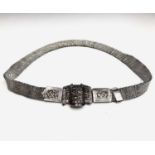 A heavy Chinese woven silver belt with chased silver buckle 240gm