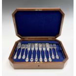 A top quality set 12 fish knives and 11 forks by Martin Hall in burr walnut veneered case