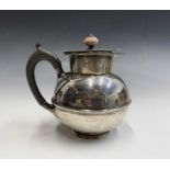 A Liberty silver hot water jug with globular body and hinged lid Birmingham 1933 11.7oz Ht 15cm