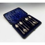 A set of six pierced and chased teaspoons and matching tongs Sheffield 1899 3.1oz Cased