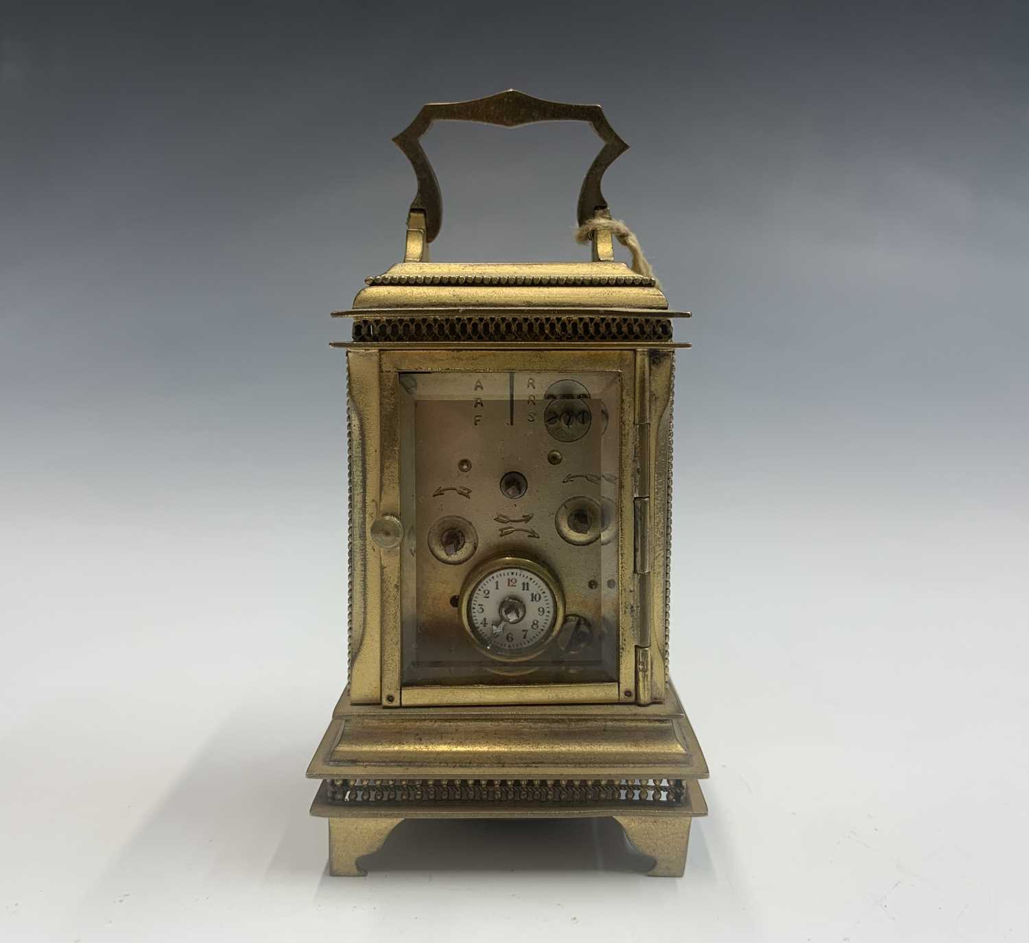 A French Art Nouveau gilt bronze miniature alarm carriage clock. - Image 2 of 5